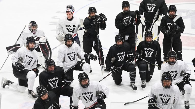 Montreal players look on during Professional Women's Hockey League (PWHL)...