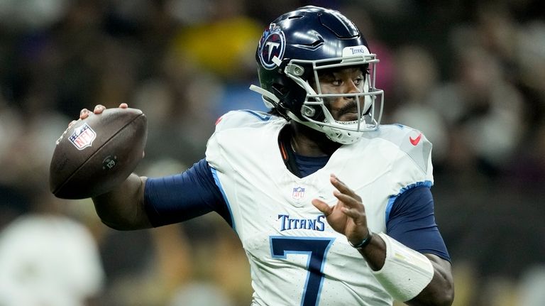 Tennessee Titans quarterback Malik Willis passes against the New Orleans...