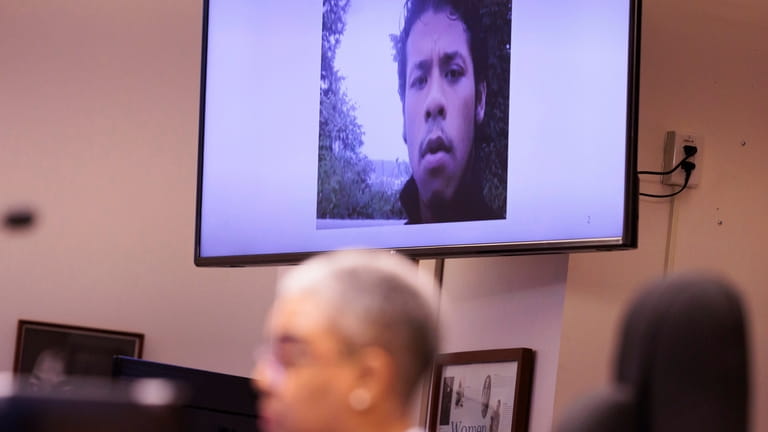 An image of Jesse Sarey is displayed during closing arguments...