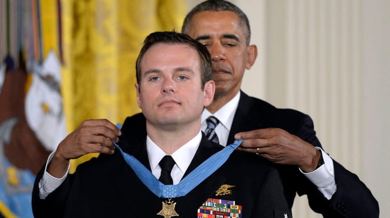 President Barack Obama presents the Medal of Honor to Navy...