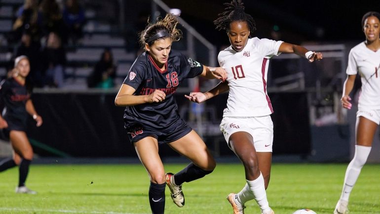 Florida State's Jody Brown (10) and Stanford's Avani Brandt (18)...