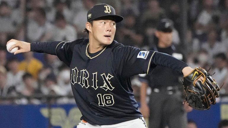 Japanese pitcher Yoshinobu Yamamoto of the Orix Buffaloes pitches against...