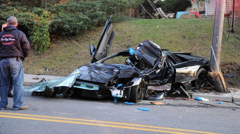 The wreckage of a Lamborghini after it crashed into a...