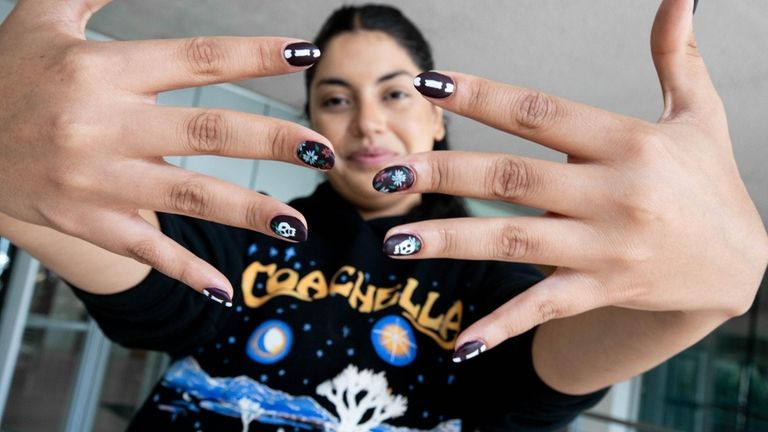 Jessica Vega shows off her nails that she had done...