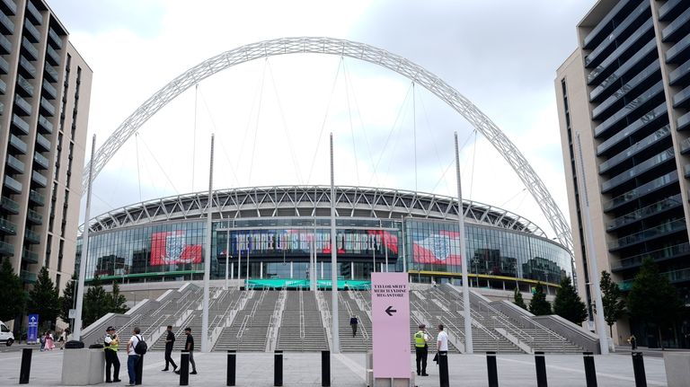 Police patrol around Wembley Stadium in London, Wednesday, Aug. 14,...