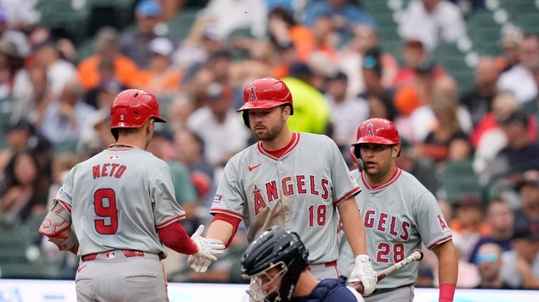 Los Angeles Angels' Zach Neto (9) is greeted by Nolan...