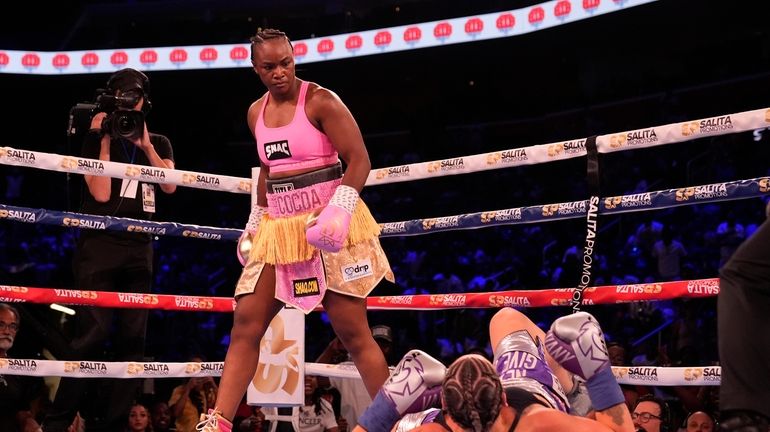 Middleweight champion Claressa Shields looks down reigning WBC women's heavyweight...