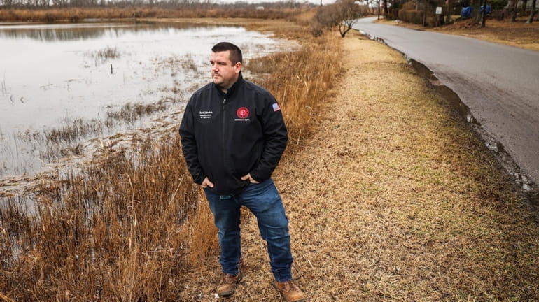Town of Southold Highway Superintendent Dan Goodwin stands near the flood...
