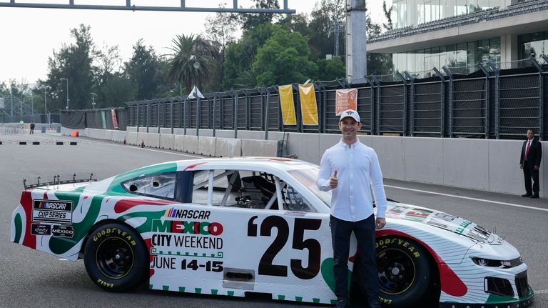 NASCAR driver Daniel Suarez, of Mexico, poses for a photo...