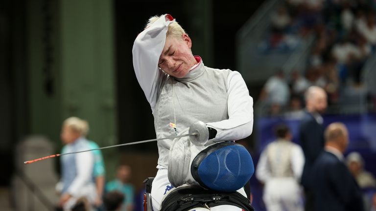 Italy's Beatrice Maria Vio Grandis looks dejected after losing to...