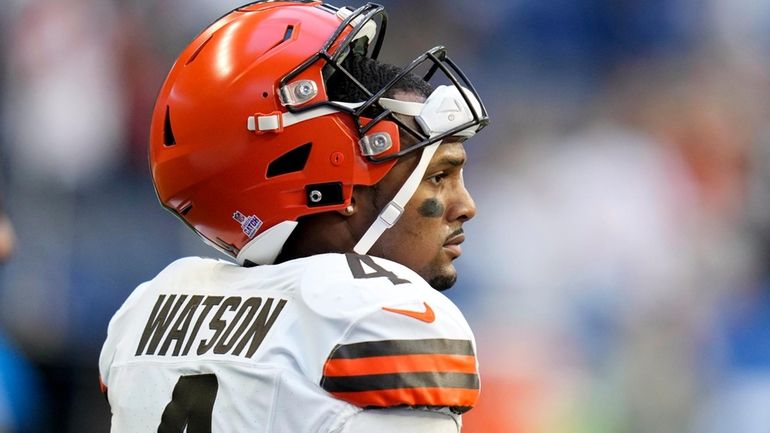 Cleveland Browns quarterback Deshaun Watson walks on the field before...