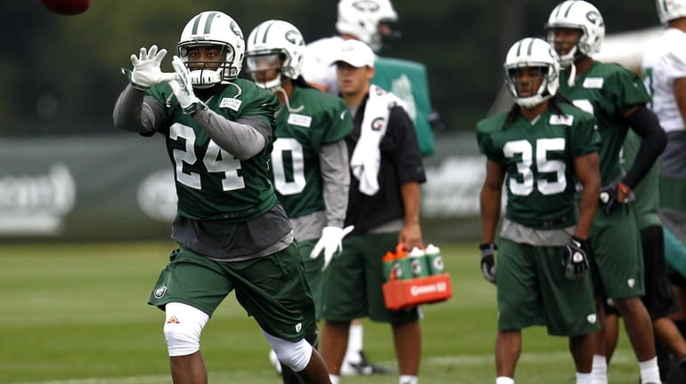 Darrelle Revis #24 of the New York Jets works out...