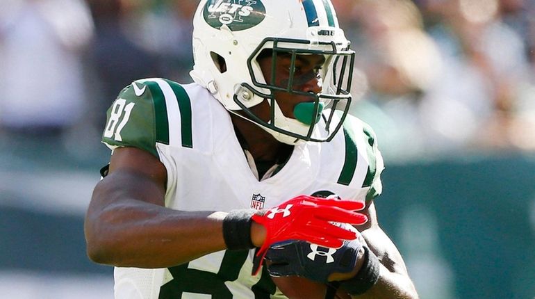 Quincy Enunwa of the Jets runs after a catch in...