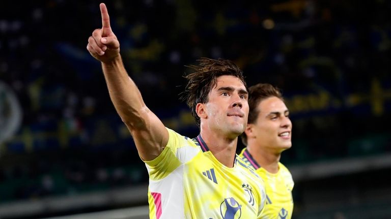 Juventus' Dusan Vlahovic (9) celebrates his penalty goal during the...