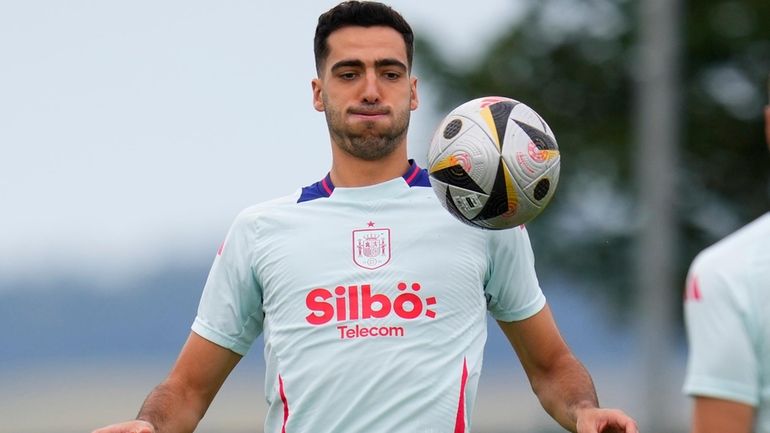 Spain's Mikel Merino controls the ball during a training session...