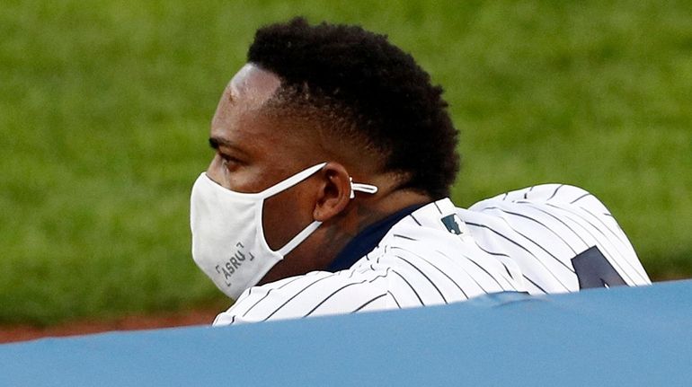 Aroldis Chapman #54 of the Yankees looks on against the Boston...