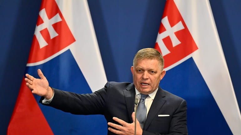 Slovakia's Prime Minister Robert Fico speaks during a press conference...