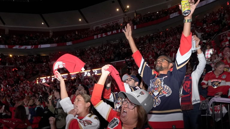 Florida Panthers fans cheer a Panthers goal against the Edmonton...