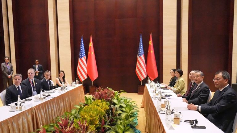 U.S. Secretary of State Antony Blinken, left, meets with Chinese...