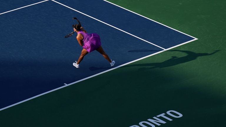 Jessica Pegula, of the United States, serves to Amanda Anisimova,...