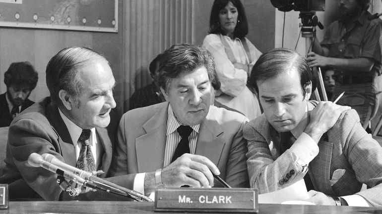 Three members of the Senate Foreign Relations committee, from left,...