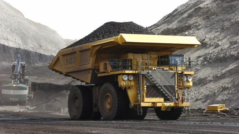 A mining dumper truck hauls coal at Cloud Peak Energy's...