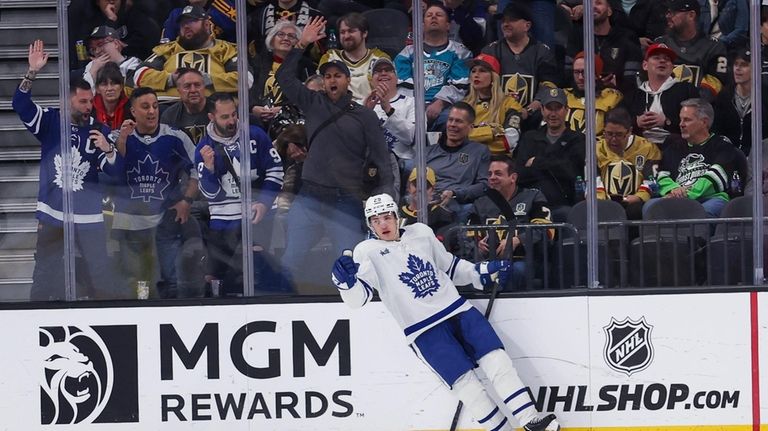 Toronto Maple Leafs right wing Pontus Holmberg (29) celebrates after...