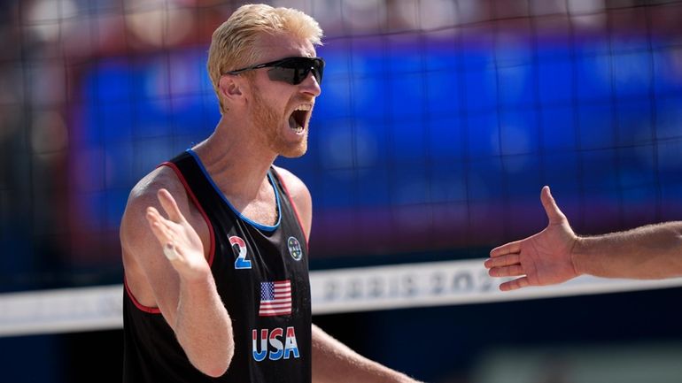 United States' Chase Budinger celebrates a point against France in...