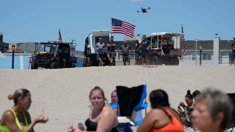 A drone lifts off at Rockaway Beach in New York,...