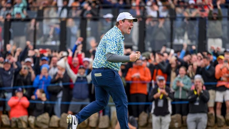 Robert MacIntyre celebrates after he wins the Genesis Scottish Open...