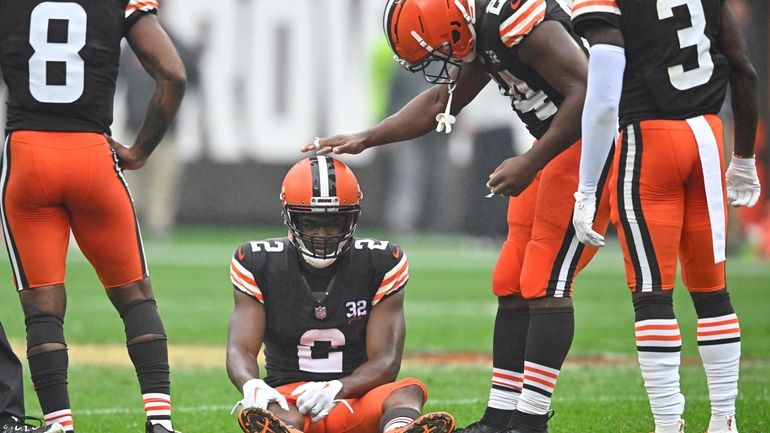 Cleveland Browns wide receiver Amari Cooper (2) is checked on...