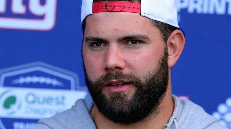 Giants guard Justin Pugh speaks to the media during minicamp...