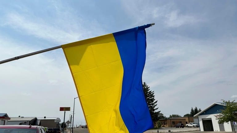 A Ukrainian flag flies outside the Ukrainian Cultural Institute in...
