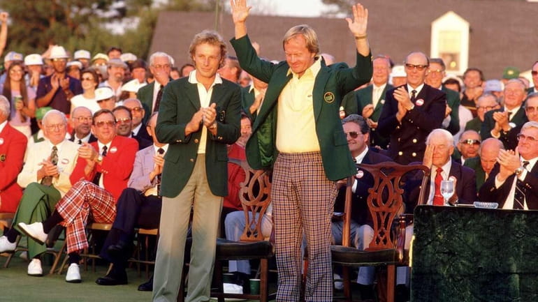 Jack Nicklaus of the USA receives the Green Jacket from...
