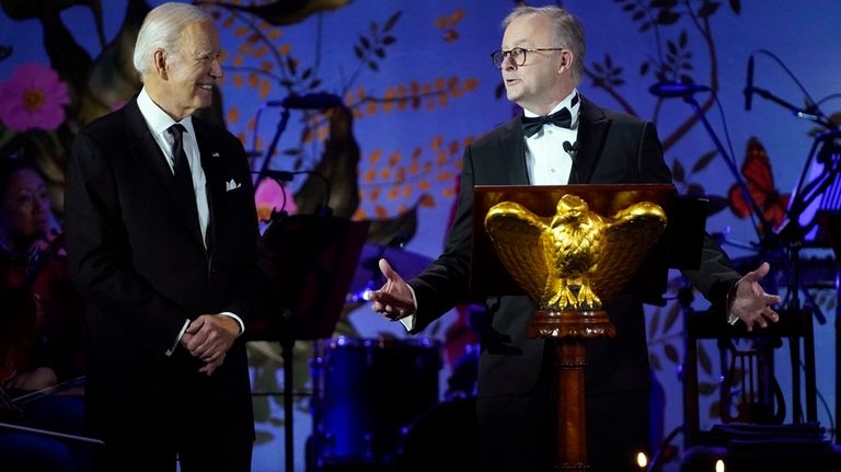 President Joe Biden listens as Australia's Prime Minister Anthony Albanese...