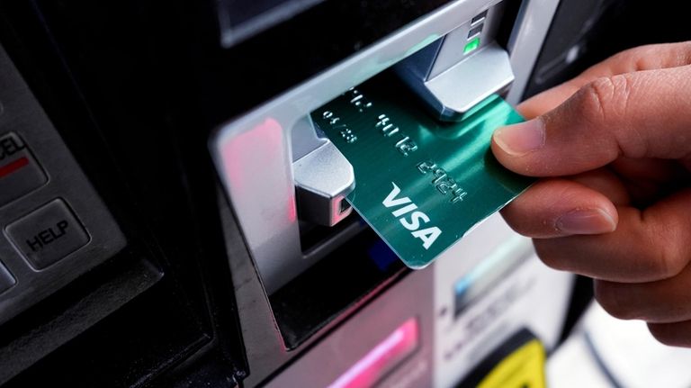 A customer uses a Visa credit card to pay for...