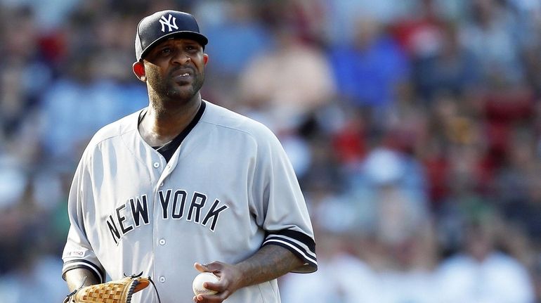 Yankees' CC Sabathia stands on the mound during the fifth...