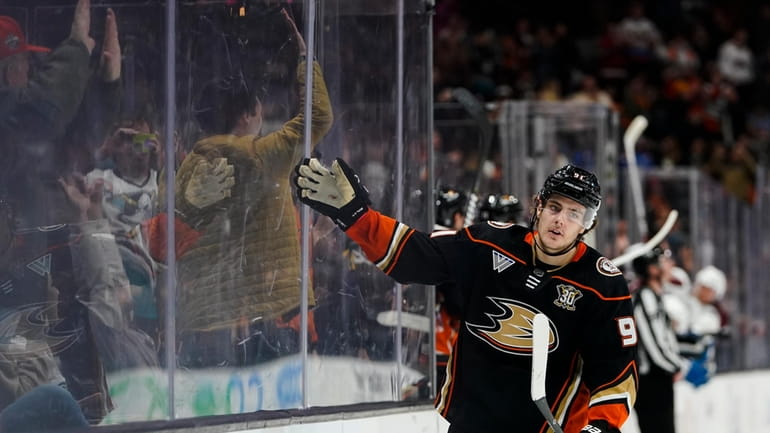 Anaheim Ducks center Leo Carlsson celebrates after scoring against the...