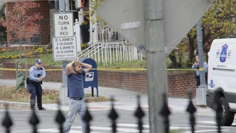 Edgar Maddison Welch, 28 of Salisbury, N.C., surrenders to police...