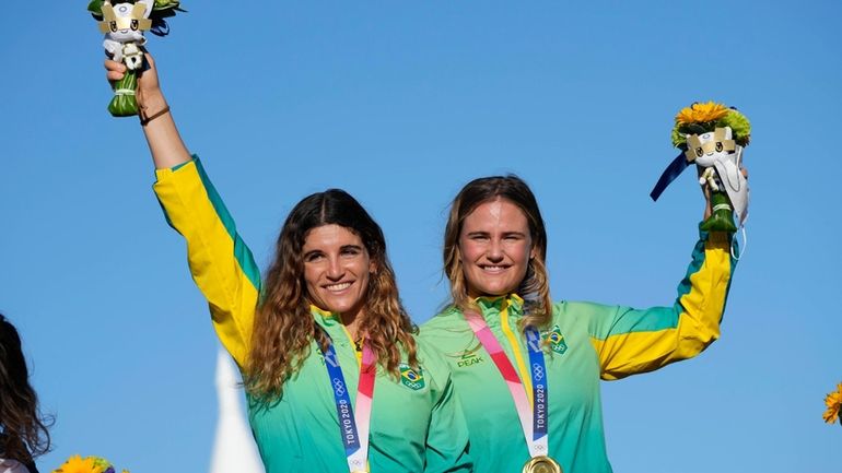 FILE- First placed Brazil's Kahena Kunze, right, and Martine Grael...