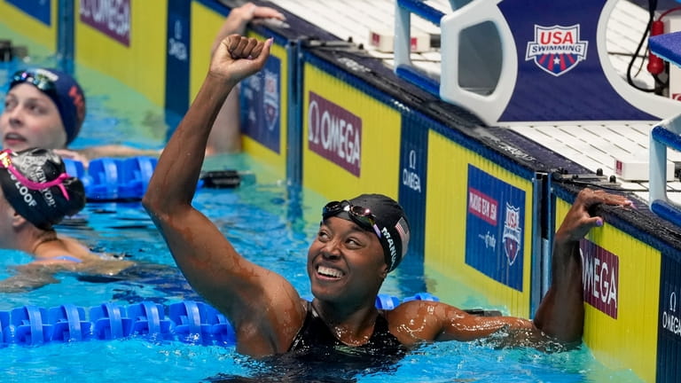 Simone Manuel reacts after winning the Women's 50 freestyle finals...
