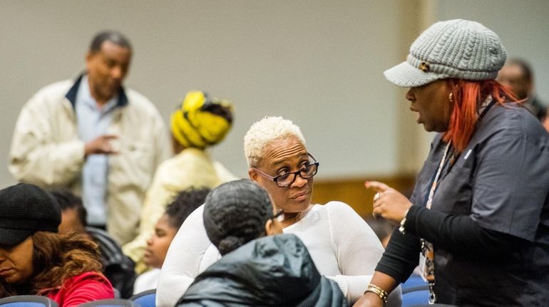 Community members at the Roosevelt school board special meeting Wednesday...