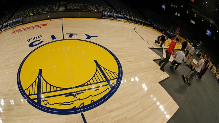 The City" logo of the Golden State Warriors is displayed...