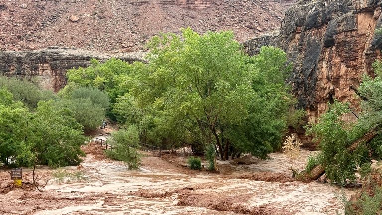 This photo provided by Michael Langer shows a flash flood...