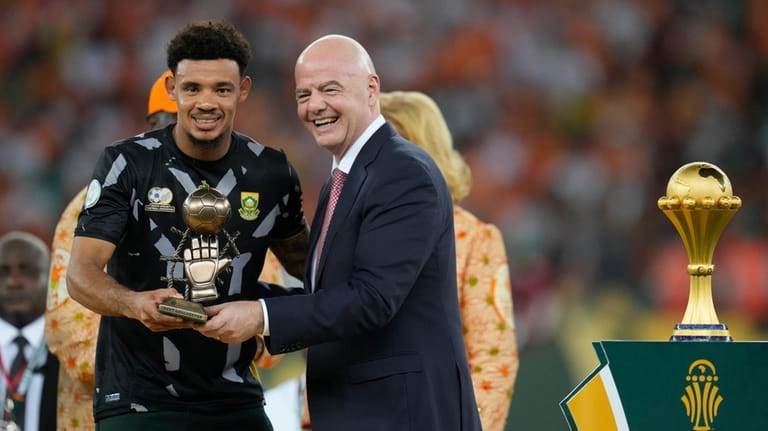 South Africa's goalkeeper Ronwen Williams receives the goalkeeper of the...