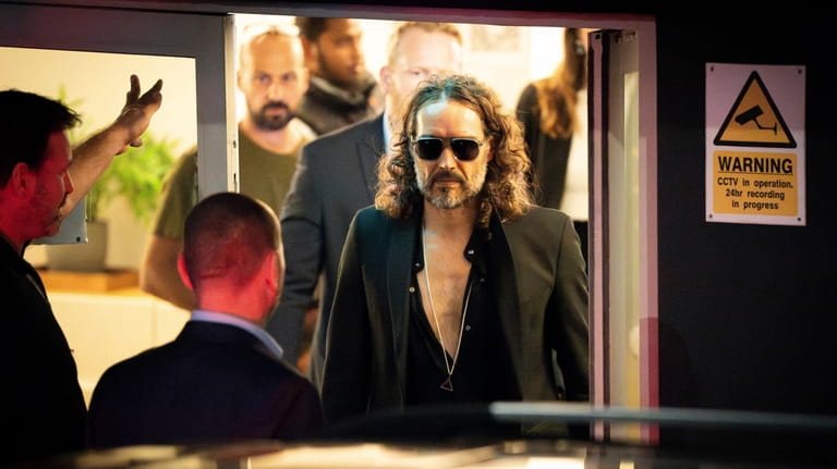 Russell Brand leaves the Troubabour Wembley Park theater in northwest...