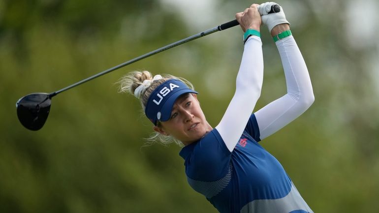 Nelly Korda, of the United States, hits her shot from...