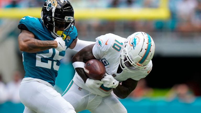 Jacksonville Jaguars cornerback Ronald Darby (25) defends Miami Dolphins wide...