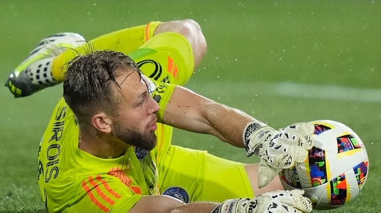 CF Montréal goalkeeper Jonathan Sirois makes a save during the...