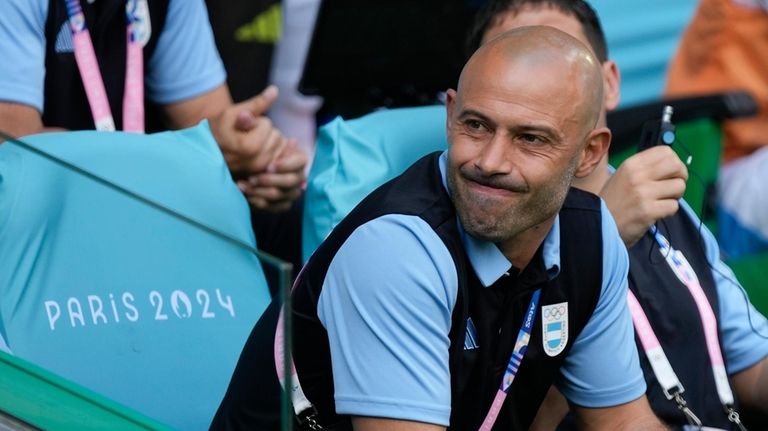 Argentina's coach Javier Mascherano gestures prior to the men's Group...